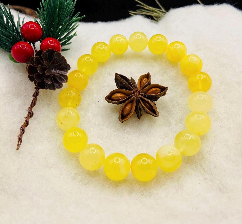 Premium klases 11mm apaļu pērlīšu Dzintara piena krāsas aporoce