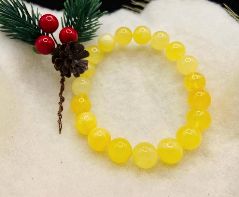 Premium klases 11mm apaļu pērlīšu Dzintara piena krāsas aporoce