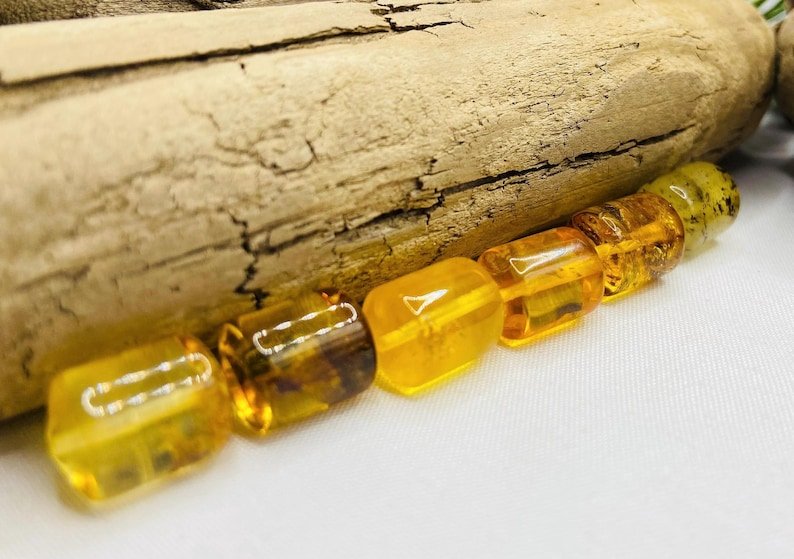 Cilindra formas Baltijas Dzintara daudzkrāsainas pērlītes