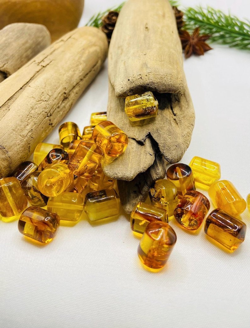 Cilindra formas Baltijas Dzintara daudzkrāsainas pērlītes