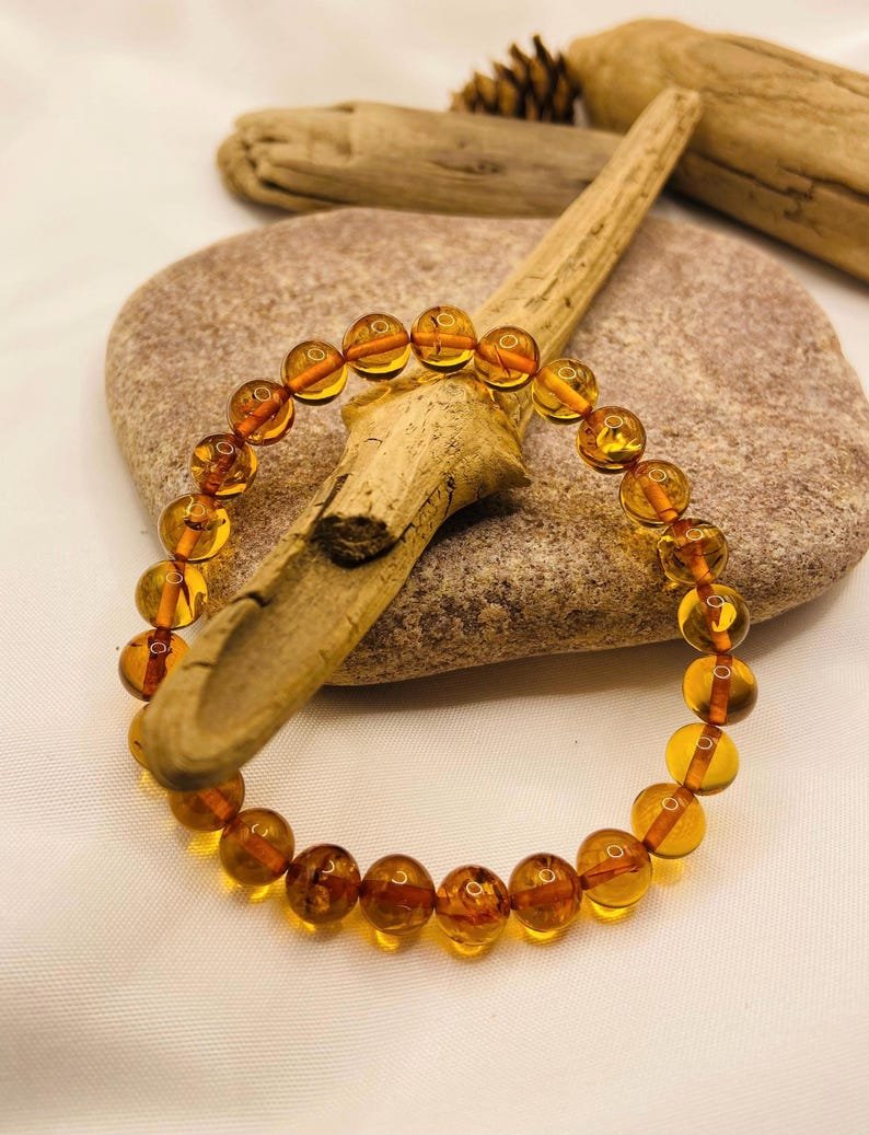 56548094-r-il-4a80df-7498241111-il_794xN.7498241111_q84u Eleganta konjaka krāsas aproce ar 8mm apaļām pērlītēm