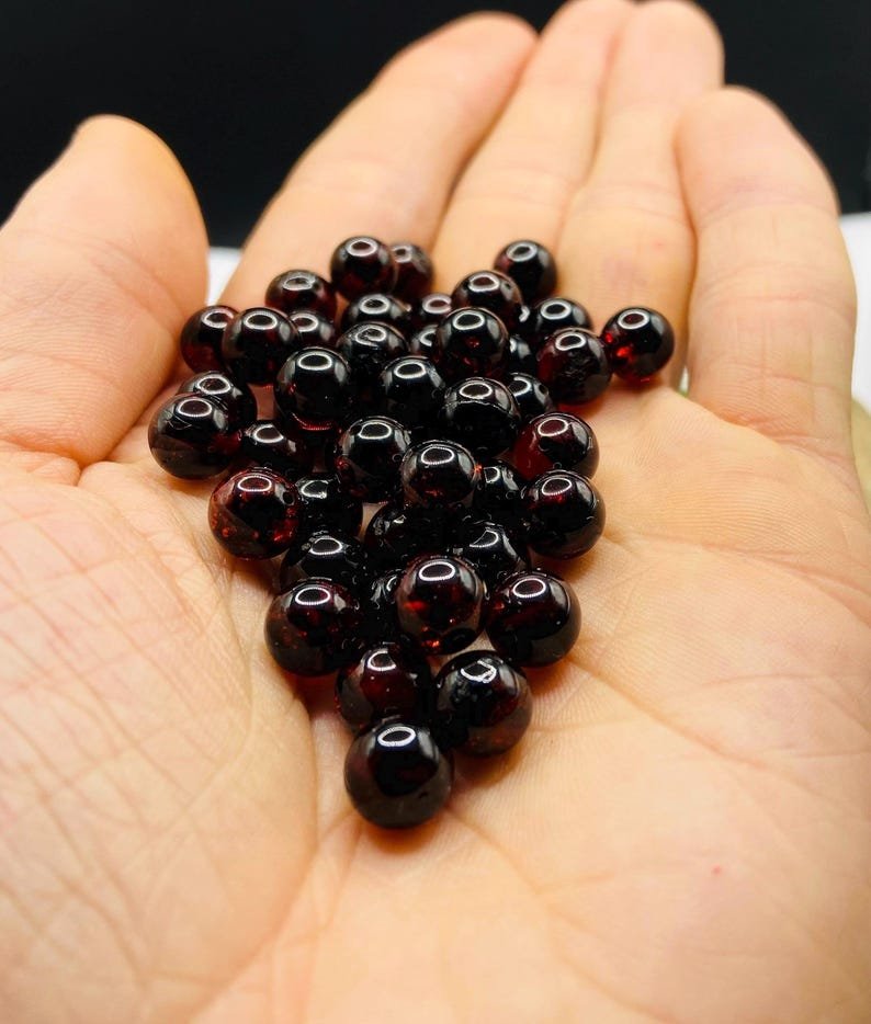 56548094-r-il-4a88bf-7638007617-il_794xN.7638007617_f0we 8mm Tumšās ķiršu Baltijas dzintara apaļās pērlītes