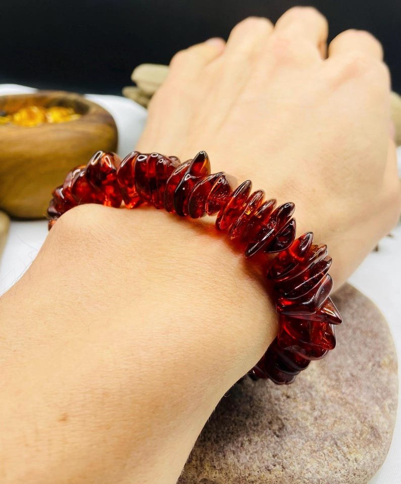 56548094-r-il-5ec9e6-7542810940-il_794xN.7542810940_kyzs Dzintara ķiršu krāsas šķelto pērlīšu aproce