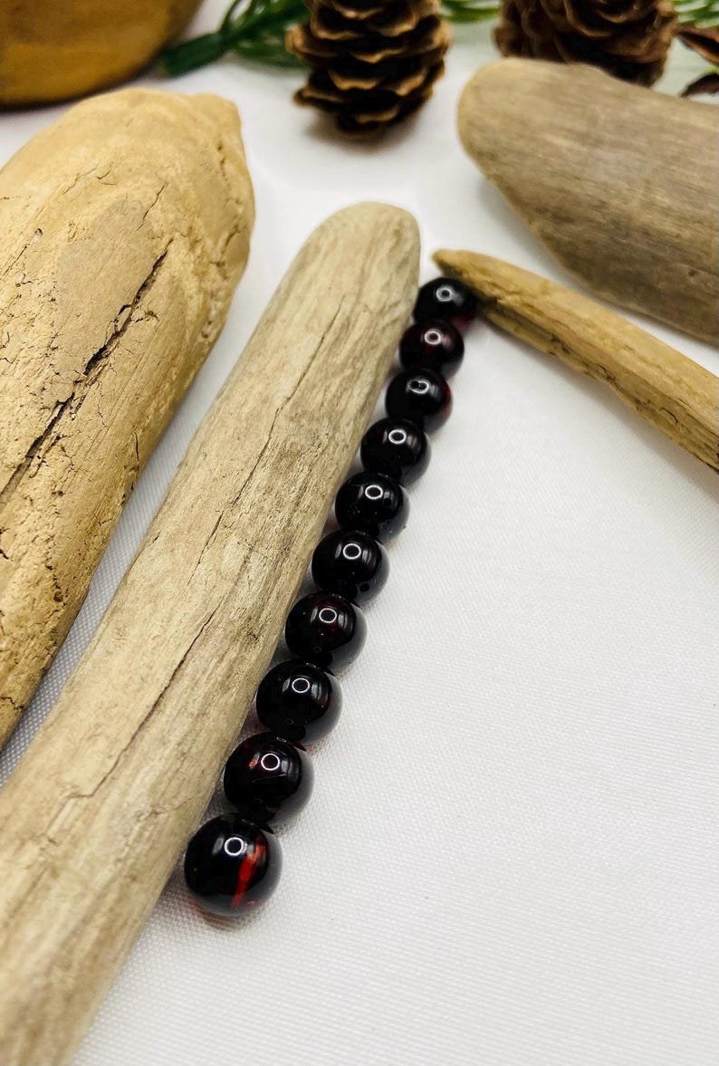 56548094-r-il-933cdd-7638006703-il_794xN.7638006703_c0h3 8mm Tumšās ķiršu Baltijas dzintara apaļās pērlītes