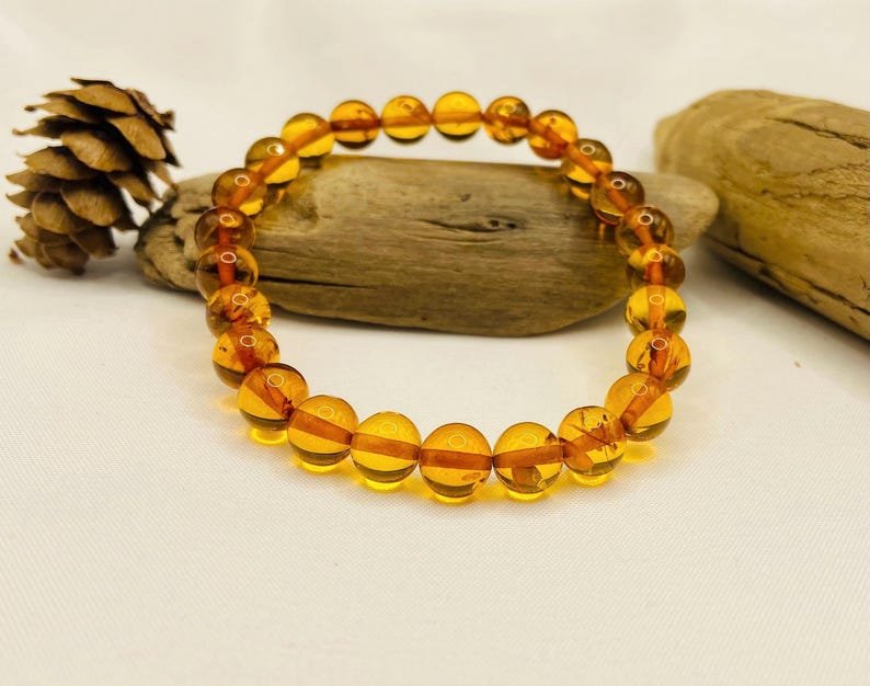 56548094-r-il-b5249d-7450309438-il_794xN.7450309438_tscc Eleganta konjaka krāsas aproce ar 8mm apaļām pērlītēm