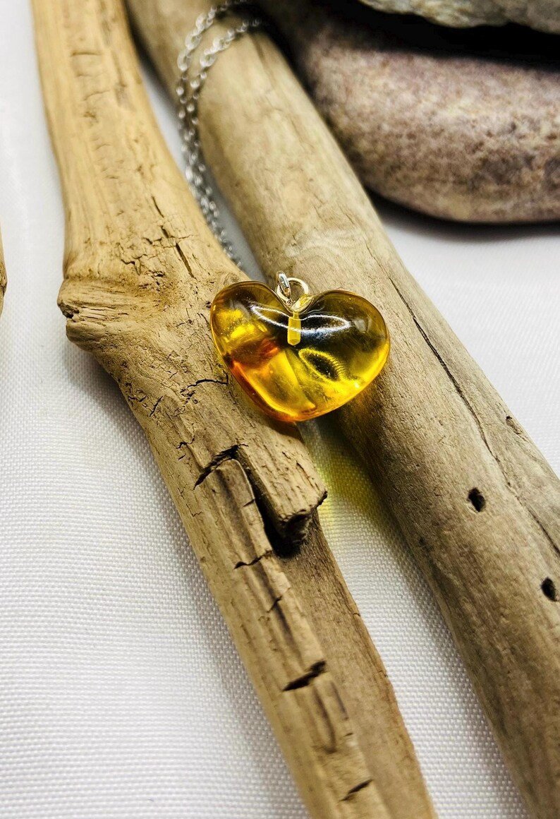 Dzeltenas dzintara sirsniņas ar sudrabu 2 variācijās