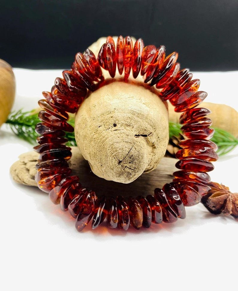 56548094-r-il-cd4228-7590743451-il_794xN.7590743451_gd92 Dzintara ķiršu krāsas šķelto pērlīšu aproce