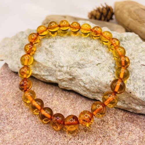 Eleganta konjaka krāsas aproce ar 8mm apaļām pērlītēm