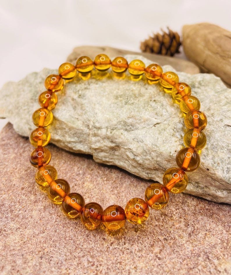 56548094-r-il-e05ea1-7450313858-il_794xN.7450313858_de3j Eleganta konjaka krāsas aproce ar 8mm apaļām pērlītēm