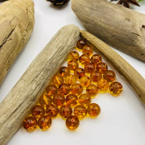 8mm Konjaka krāsas Baltijas dzintara apaļās pērlītes