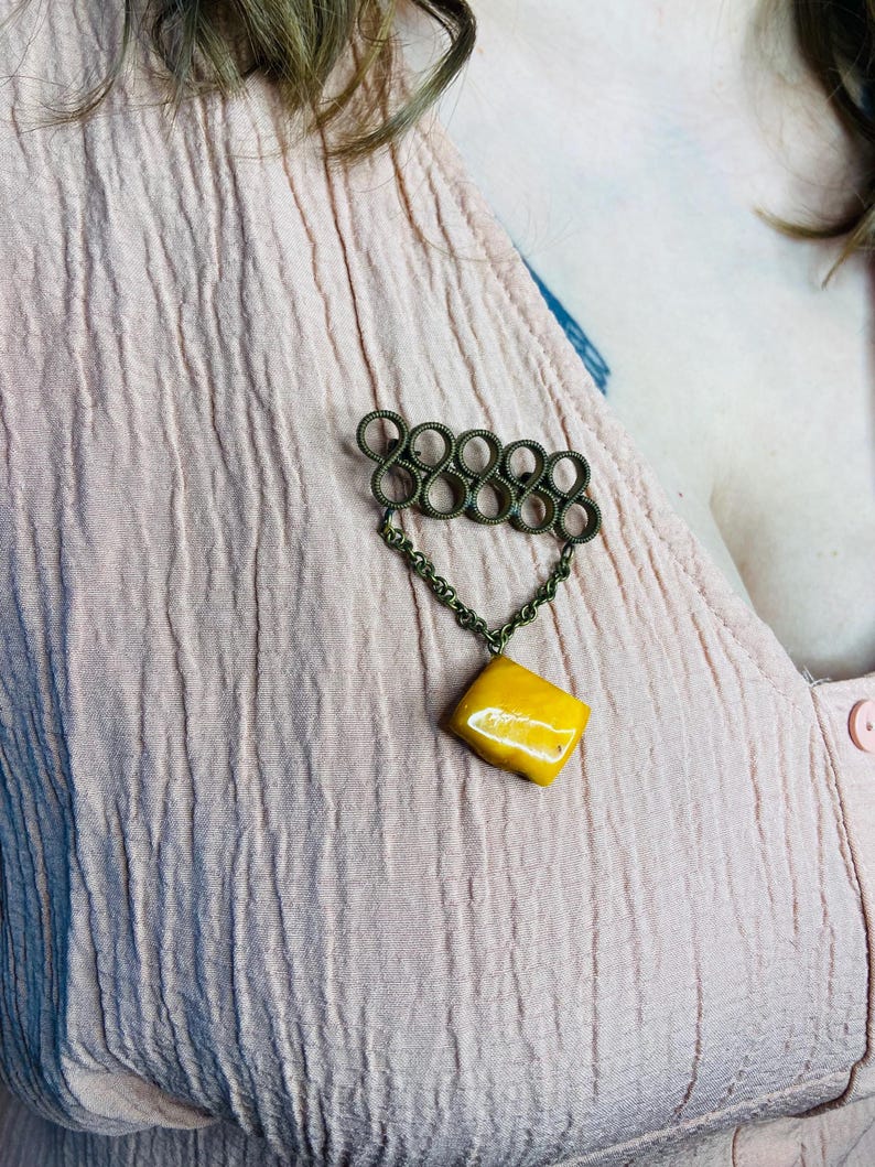 56548094-r-il-600bcd-7724715221-il_794xN.7724715221_sb7k Vecmodīga Baltijas dzintara padomju piespraude no 1980. gadiem