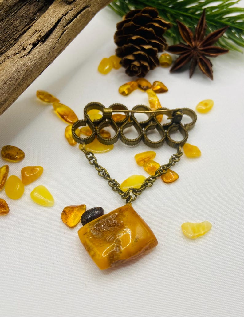 56548094-r-il-d59a59-7724714967-il_794xN.7724714967_rrzf Vecmodīga Baltijas dzintara padomju piespraude no 1980. gadiem