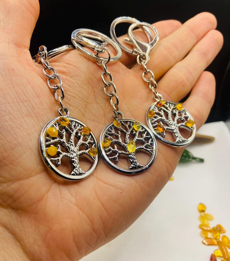 Baltijas Dzintara metāliski piekariņi ar dzīvības koku